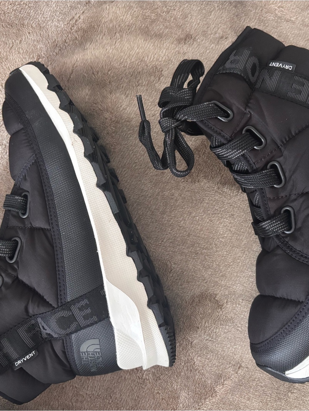The North Face Women’s Black and White Winter Rain Boots